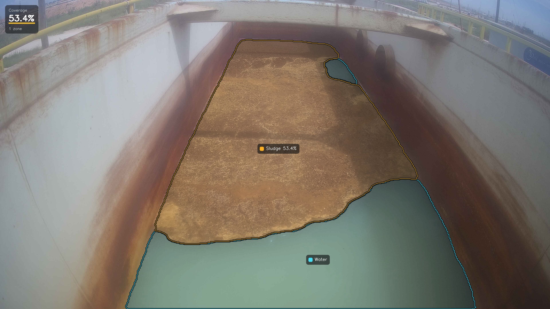 Same tank at 23% sludge coverage as the float builds
