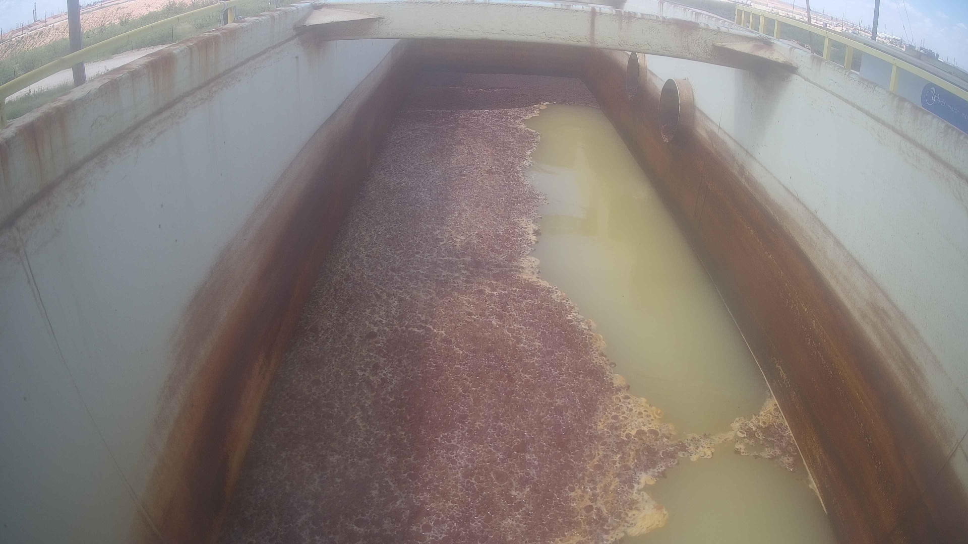 Raw effluent tank camera feed, frame 1: only a general visual impression, no numbers