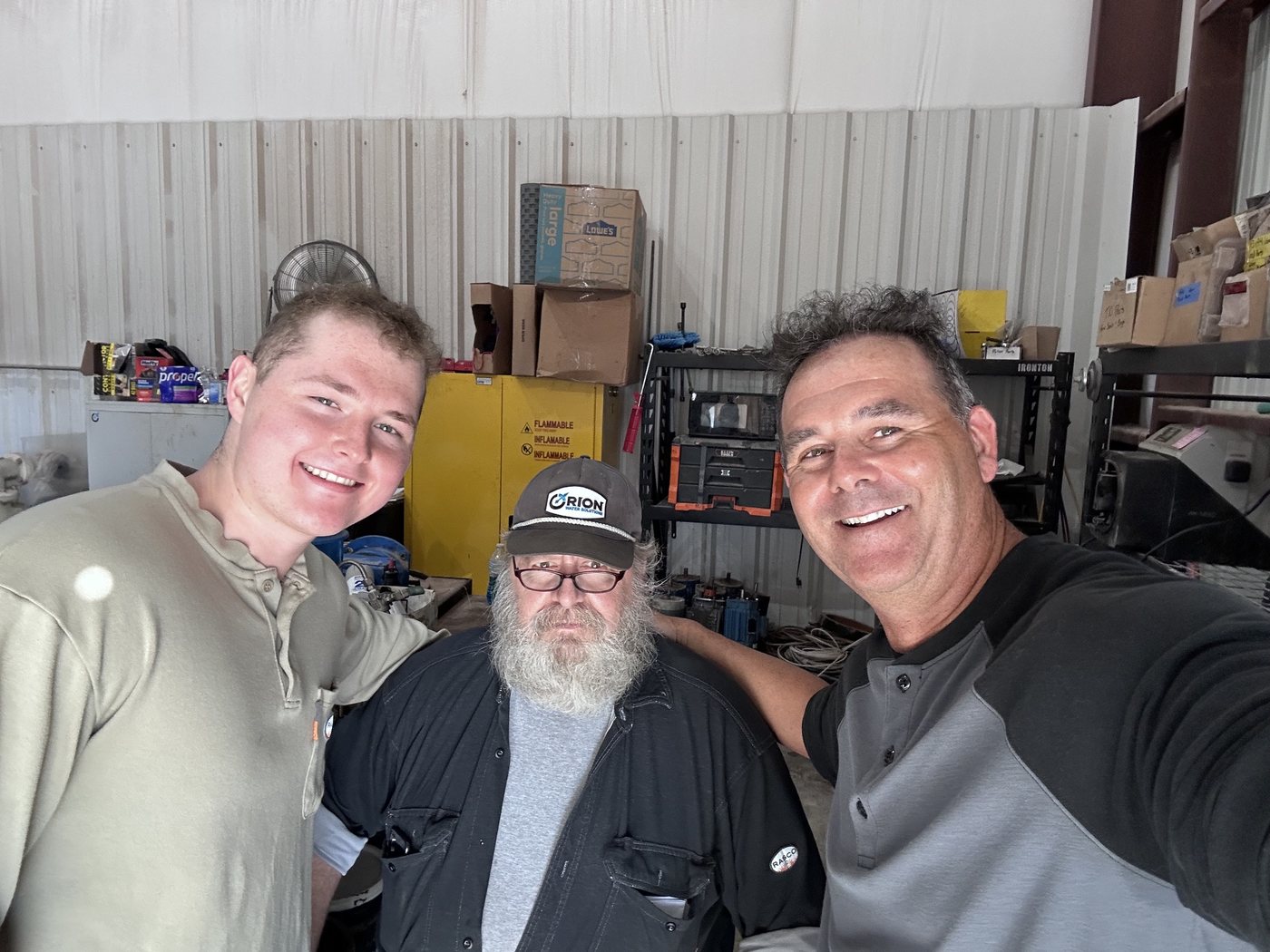 Ryan, Jim and Ivan at the equipment shop
