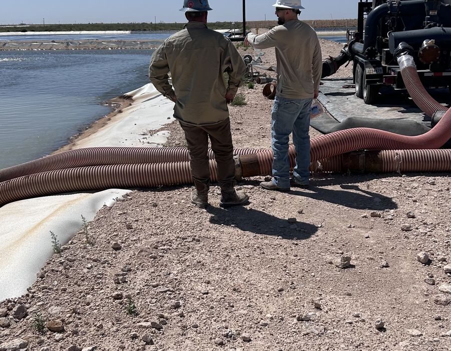 XPC Water and the Orion crew inspecting a pond.