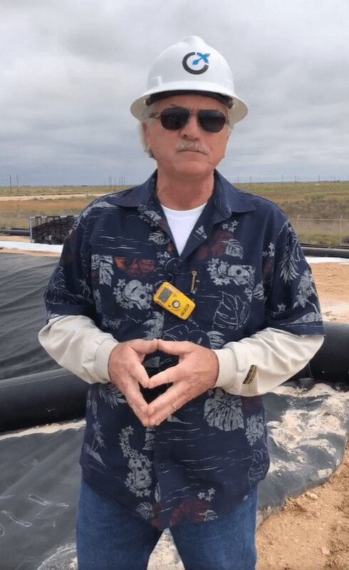 Gary Griesenbeck reviewing frac fluid